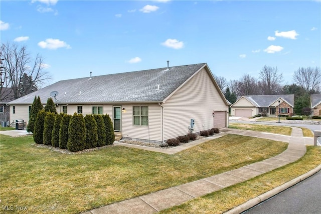1089 Park Pl, Niles, OH 44446 - exterior space with a garage and a lawn