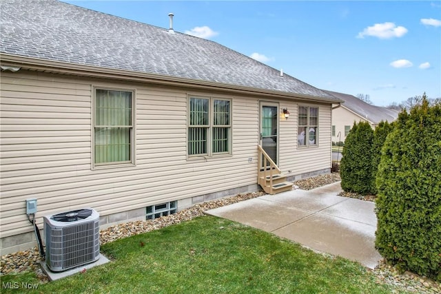 1089 Park Pl, Niles, OH 44446 - rear view of house featuring a yard, a patio, and central air condition unit