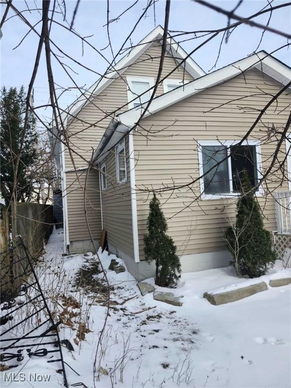 view of snow covered property