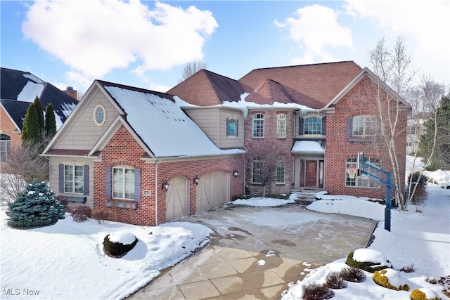 view of front of property with a garage