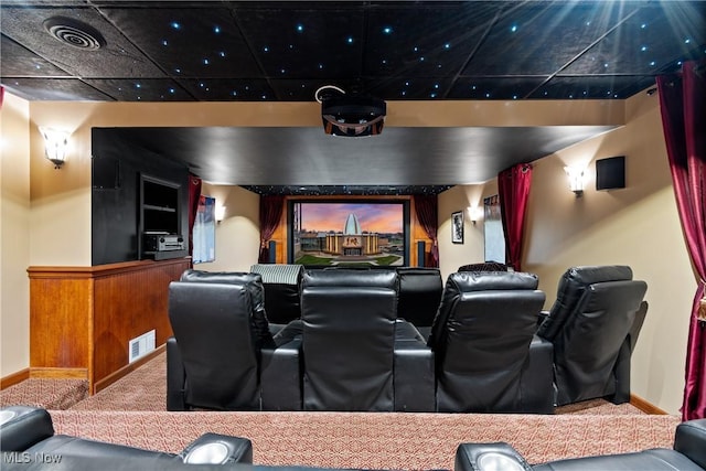 home theater room featuring carpet floors