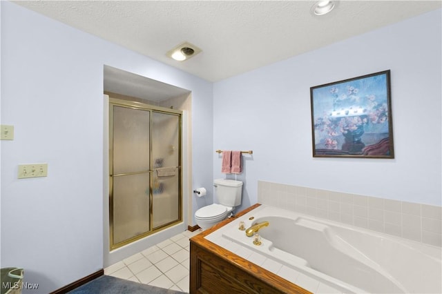 bathroom with tile patterned flooring, plus walk in shower, a textured ceiling, and toilet