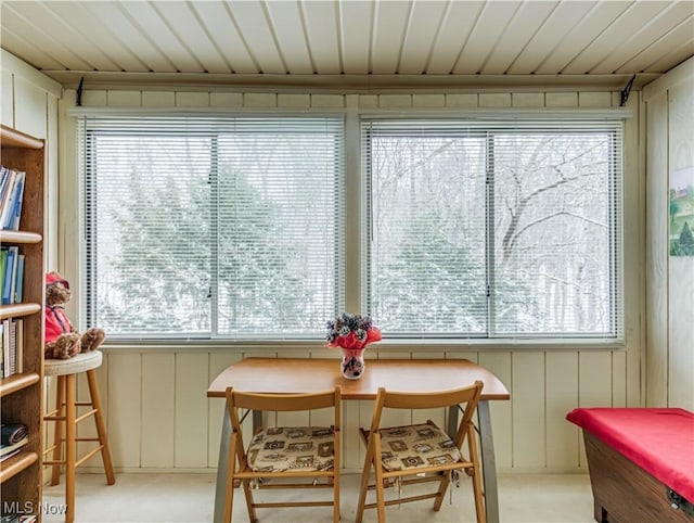 sunroom / solarium featuring a healthy amount of sunlight