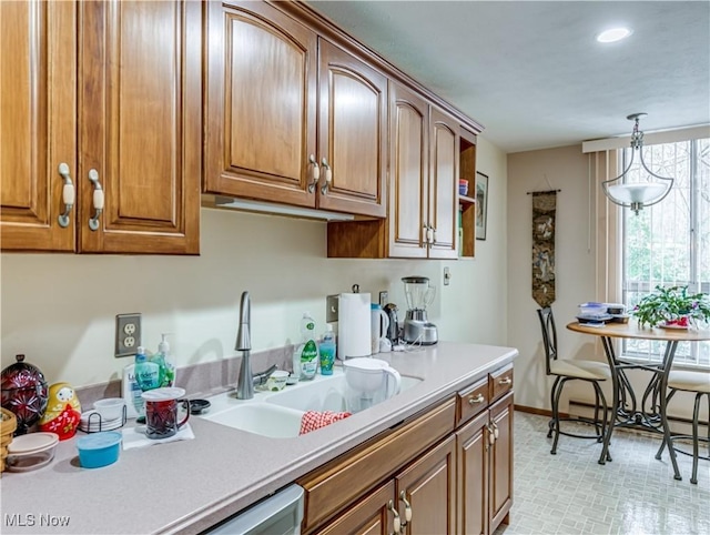 kitchen with pendant lighting and sink