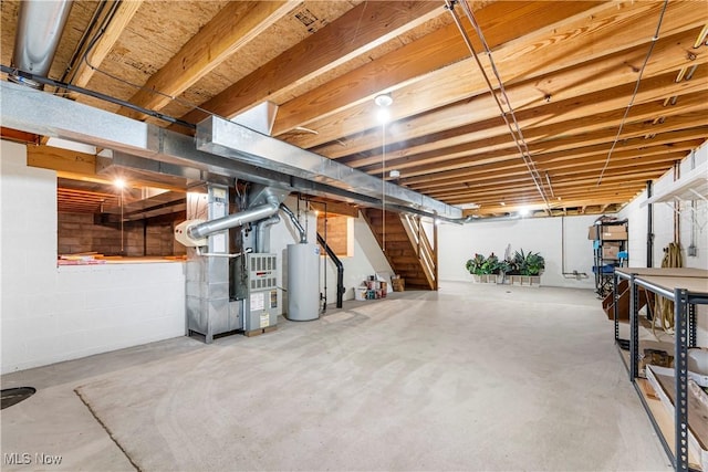 basement with heating unit and gas water heater