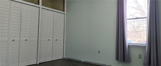 empty room featuring dark hardwood / wood-style floors