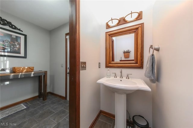 bathroom featuring baseboards