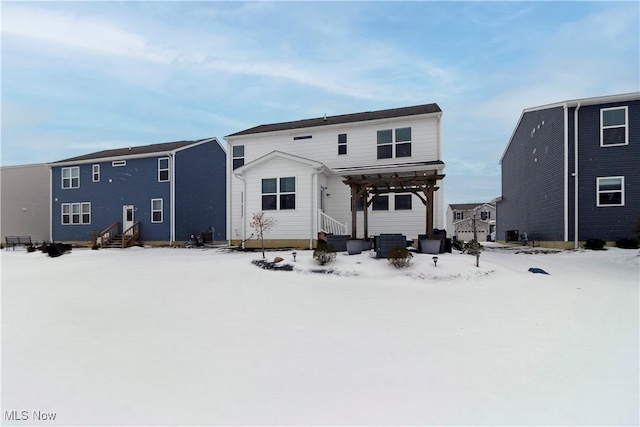 view of snow covered house