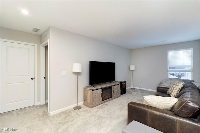 living room with light colored carpet