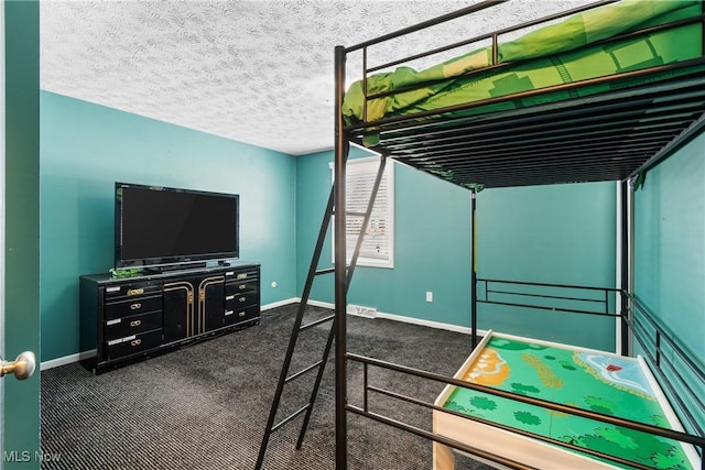 bedroom featuring a textured ceiling