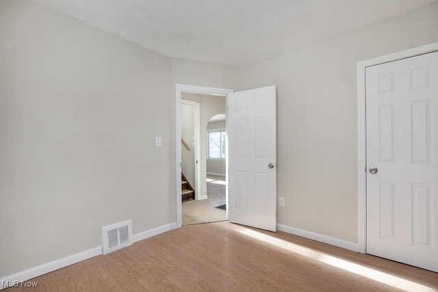 unfurnished bedroom featuring light hardwood / wood-style flooring