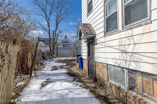 view of snow covered property