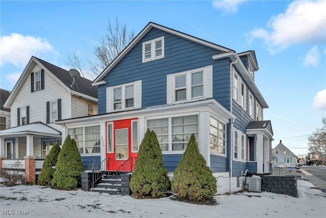 front of property featuring central AC