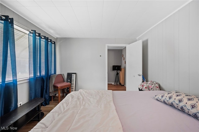 bedroom featuring dark hardwood / wood-style floors