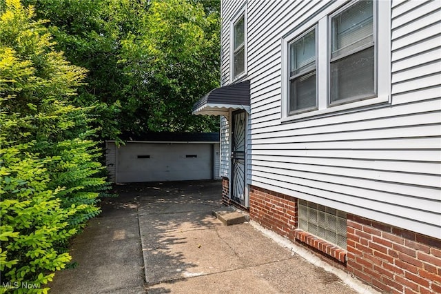 view of property exterior with a garage