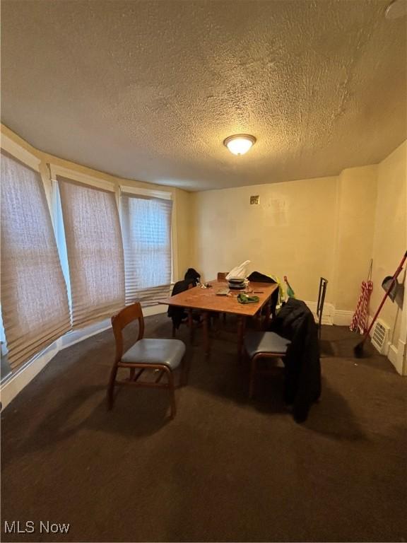 home office with a textured ceiling