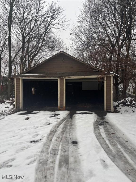 view of snow covered garage