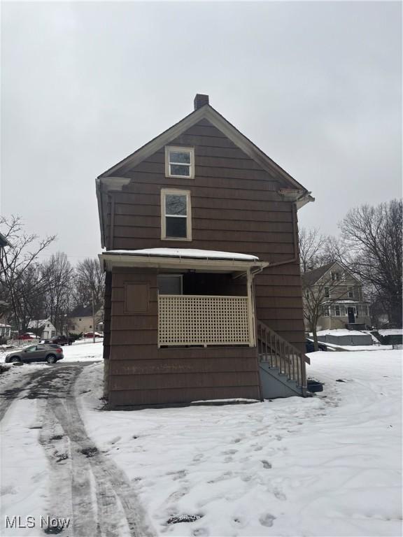 view of snow covered property