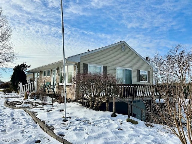 exterior space featuring a deck