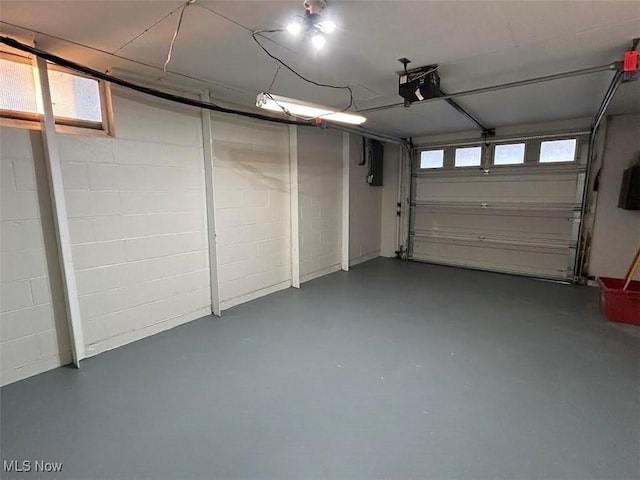 garage featuring a garage door opener