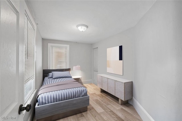 bedroom featuring light hardwood / wood-style floors