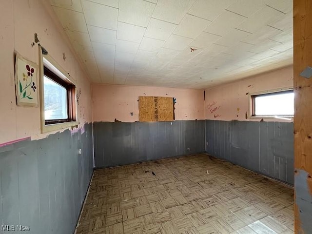 empty room with light parquet floors