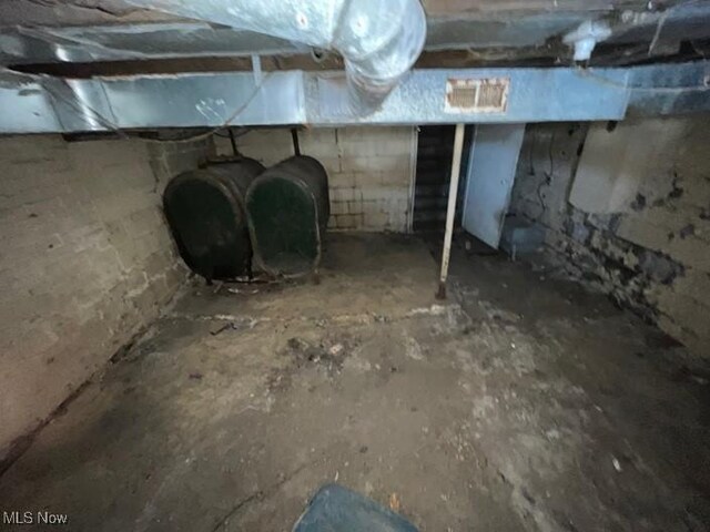 83 Watson St, Dillonvale, OH 43917 - unfinished below grade area featuring visible vents and heating fuel