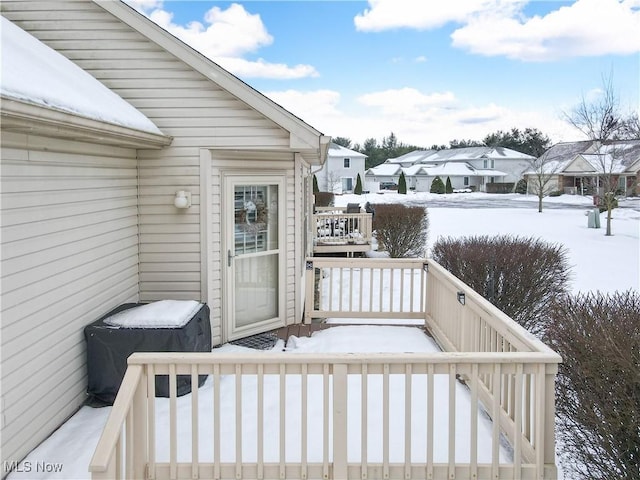 view of snow covered deck