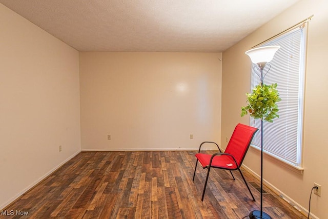 unfurnished room featuring dark hardwood / wood-style floors