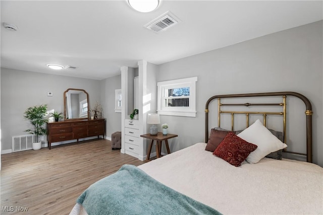 bedroom with light hardwood / wood-style flooring