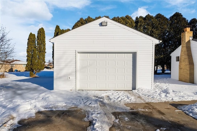 view of snow covered garage