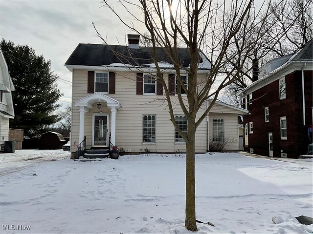 view of front facade featuring central AC unit