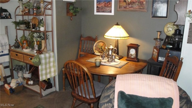 dining area with carpet flooring