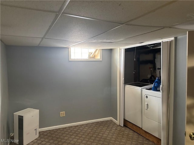 washroom featuring carpet floors and washer and clothes dryer