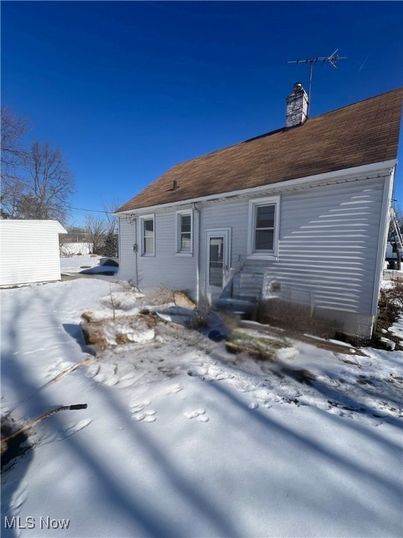 view of snow covered property