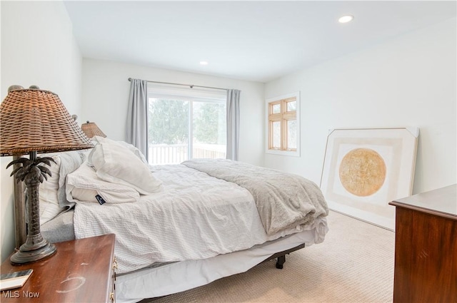 bedroom with light carpet