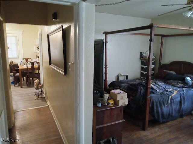 bedroom featuring wood finished floors