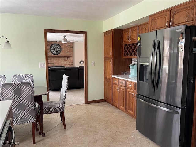 kitchen with stainless steel fridge with ice dispenser