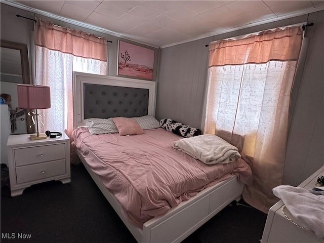 bedroom featuring ornamental molding