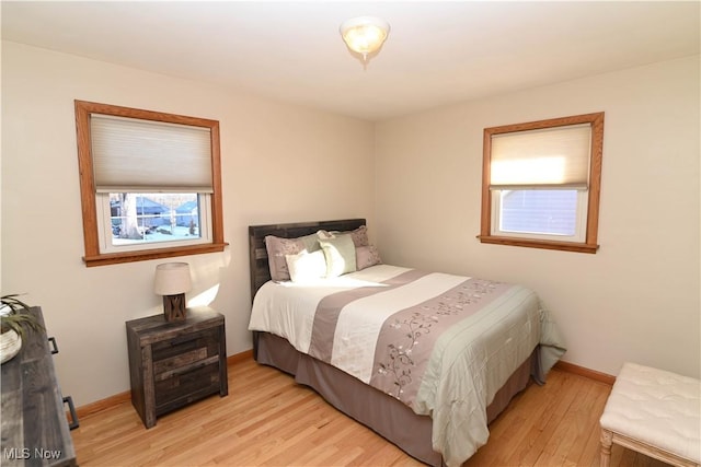 bedroom featuring light wood-type flooring