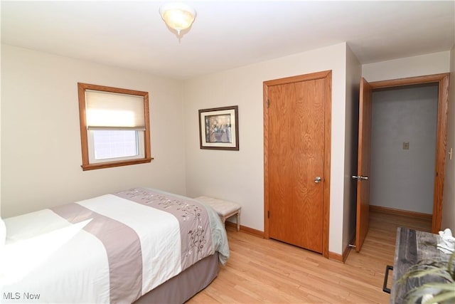 bedroom with light hardwood / wood-style floors