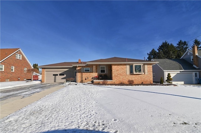 single story home featuring a garage