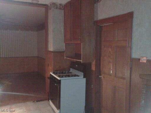 kitchen featuring white gas range oven