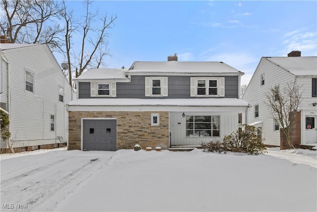 view of front of property with a garage