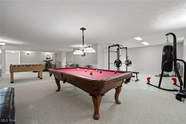 game room with billiards and a textured ceiling