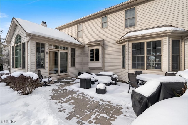 view of snow covered property