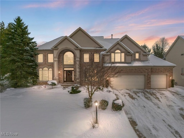 view of front of property featuring a garage