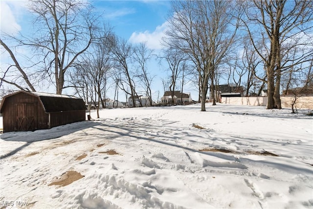 view of yard covered in snow