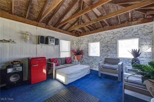 carpeted bedroom featuring vaulted ceiling