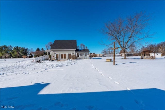 view of yard covered in snow